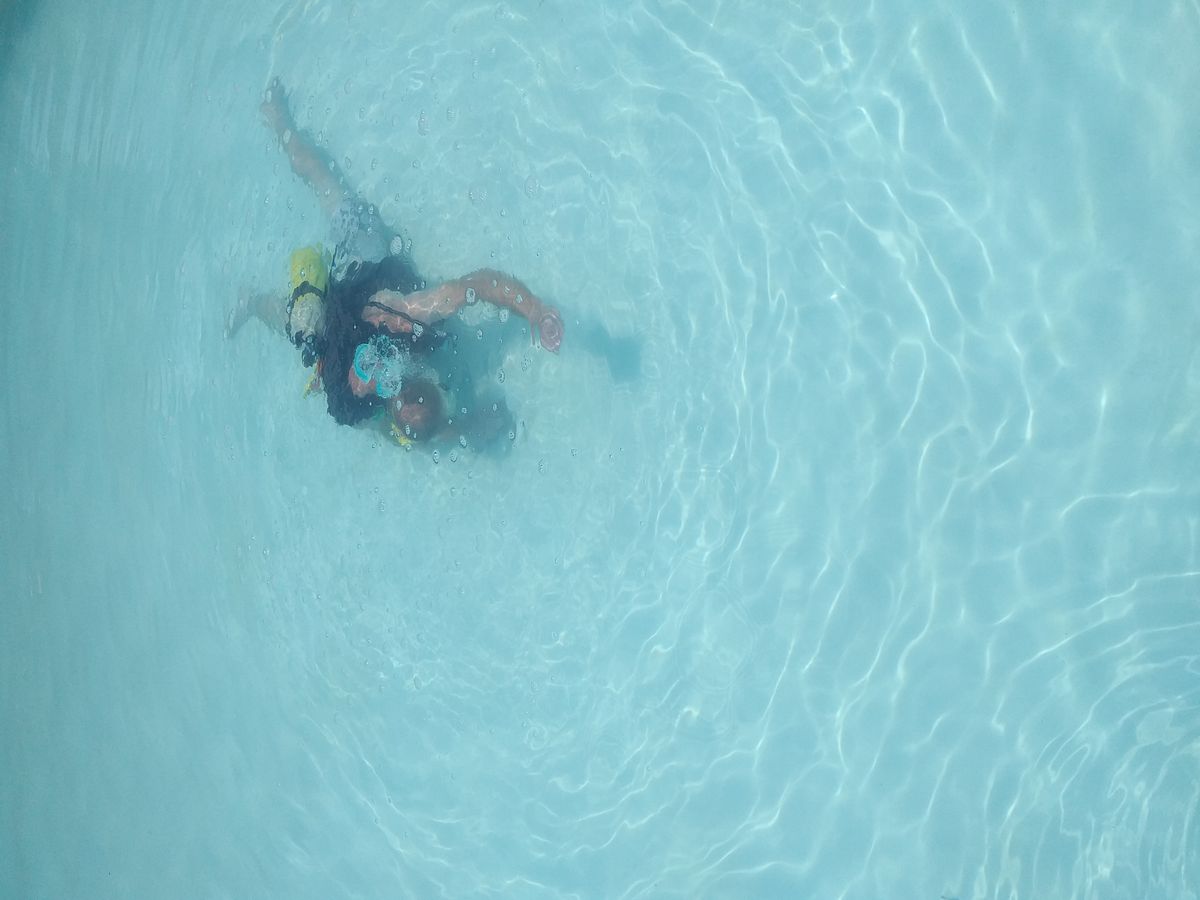 Swimming in a clean, clear pool kept that way by Aqua-Genie